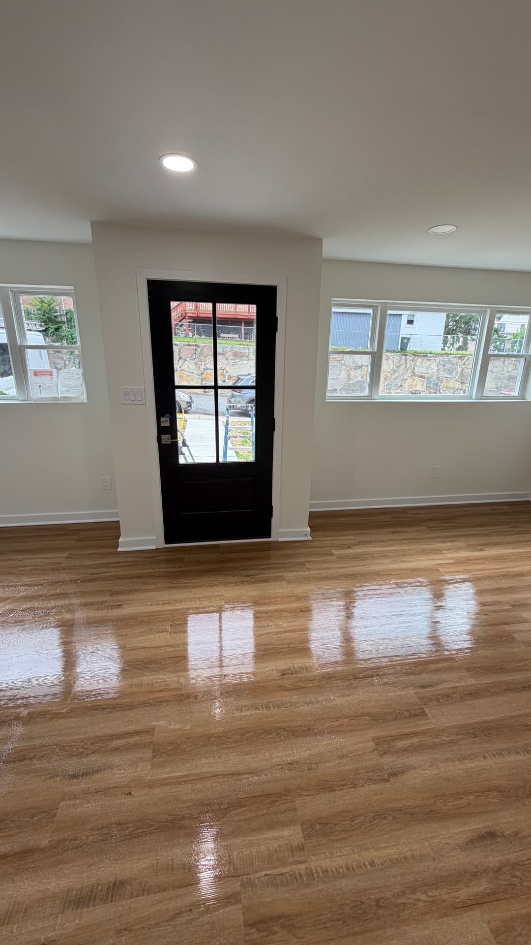 Post-construction final clean — living room and entry